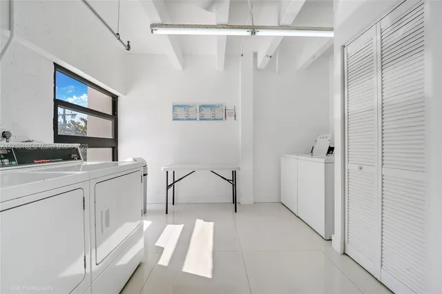 a bathroom with a sink a mirror and a bathtub