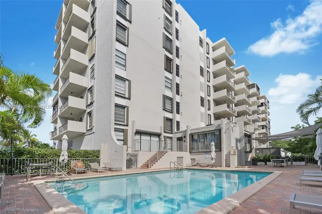 front view of building with a yard