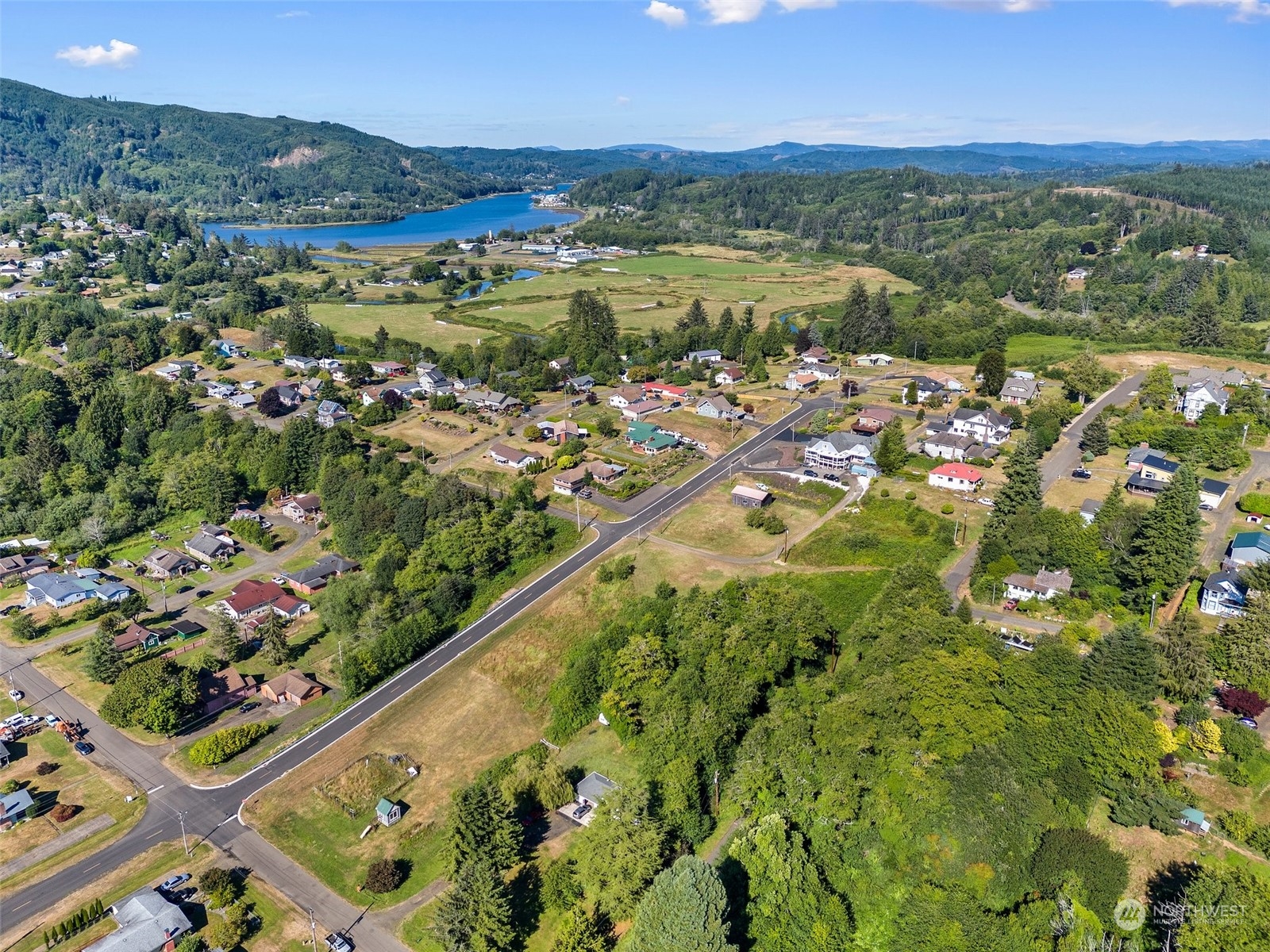 0 X Water Street South Bend, WA 98586 - Photo 4 of 12 a view of a city with mountains in the background