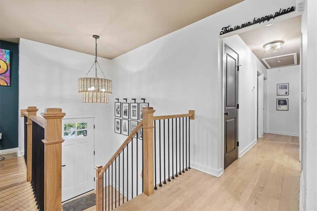 2930 Oakland Road Bethlehem, PA 18017 - Photo 45 of 55 Crisp white walls and warm wood flooring frame a welcoming entry and central hallway.