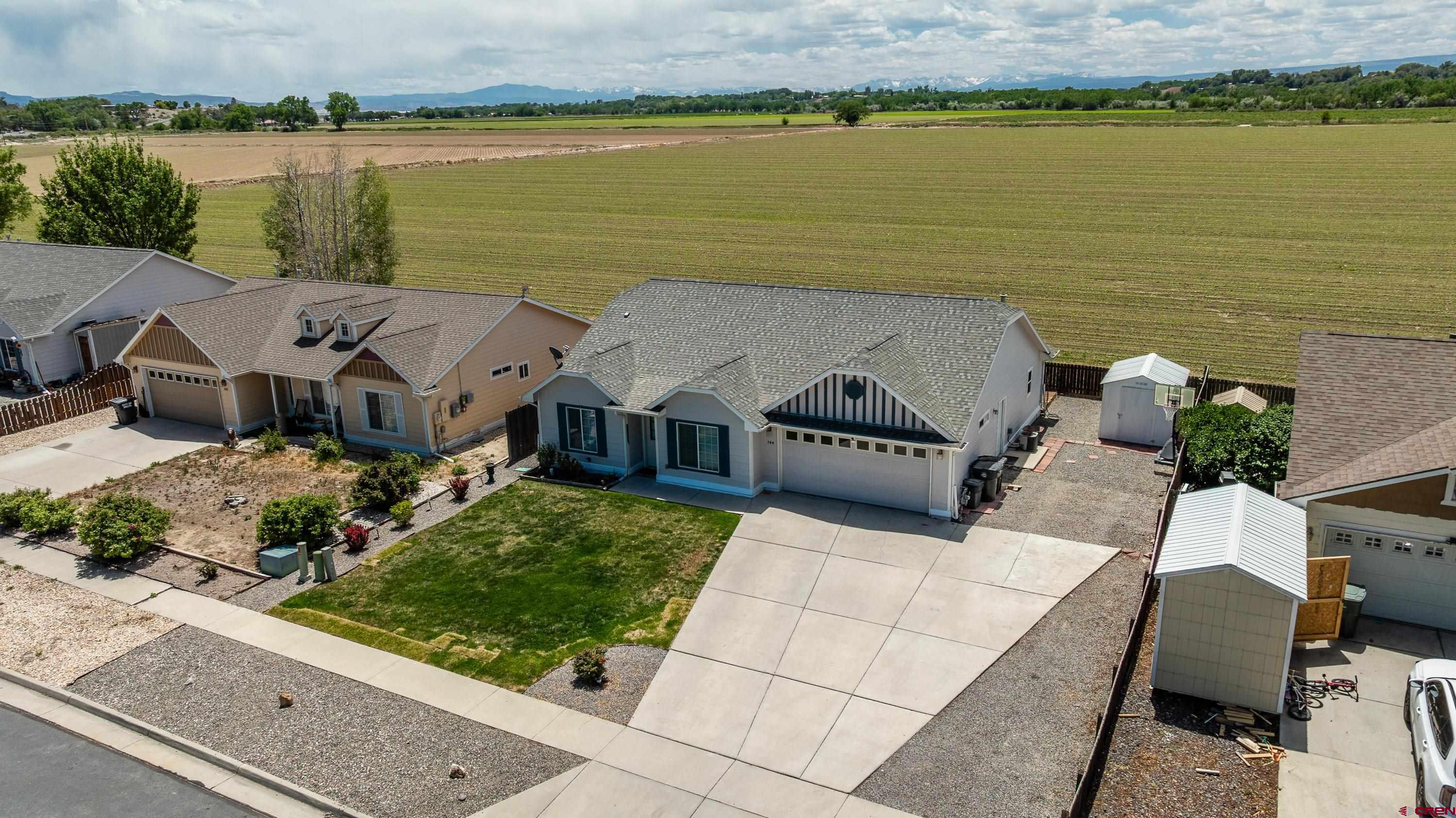 544 20th Street Delta, CO 81416 - Photo 39 of 44 an aerial view of a house with outdoor seating and lake view