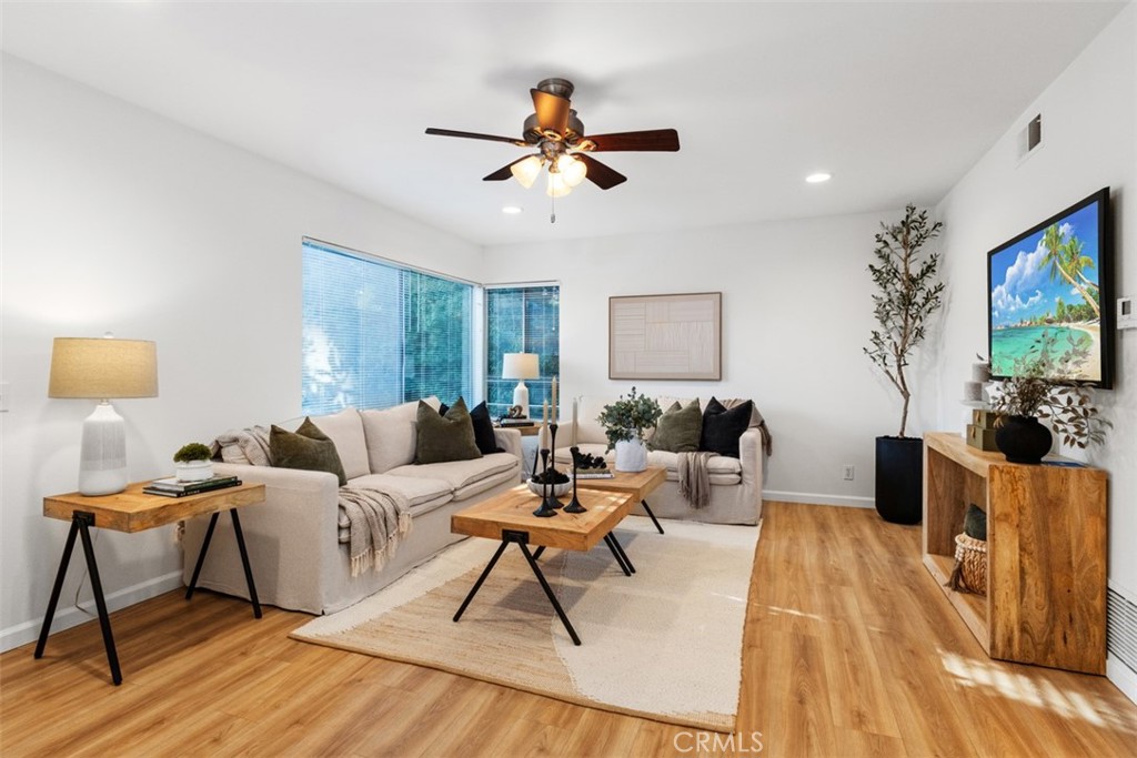56 Windjammer Irvine, CA 92614 - Photo 4 of 31 a living room with furniture and a large window