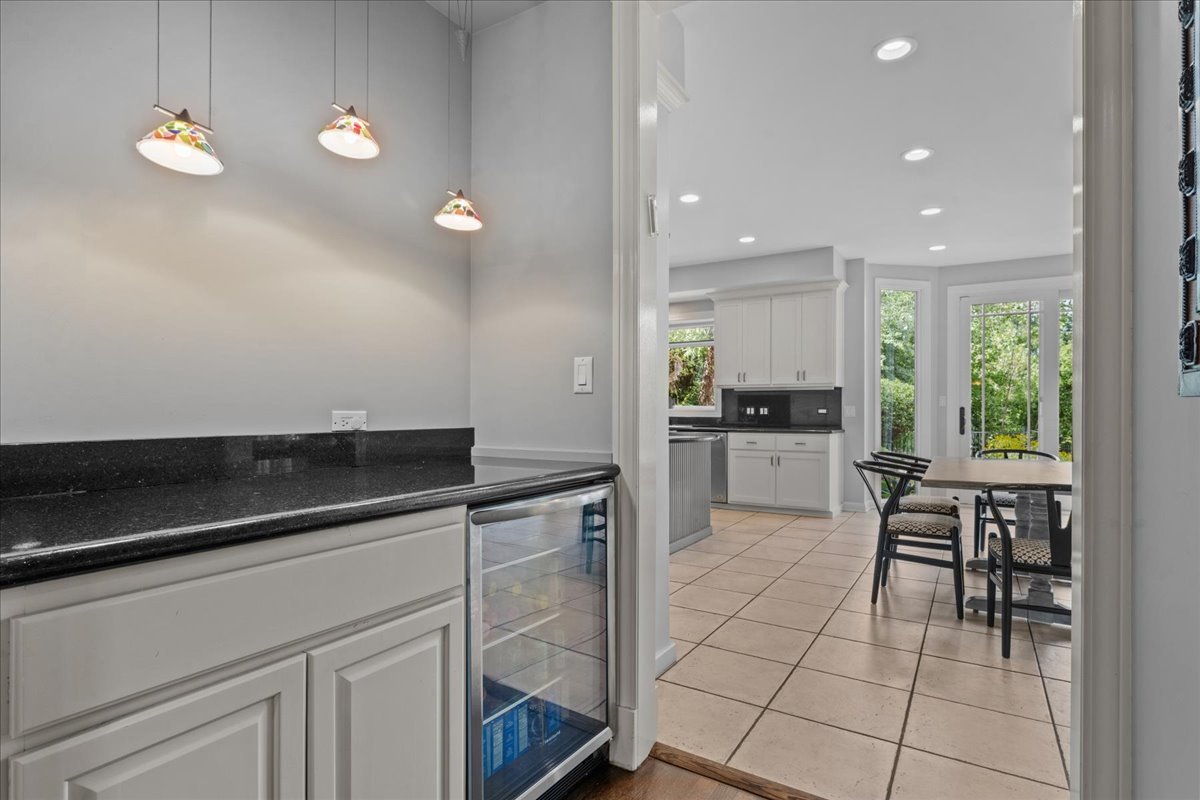 101 Crestview Drive Deerfield, IL 60015 - Photo 13 of 37 a kitchen with kitchen island a counter top space appliances and cabinets