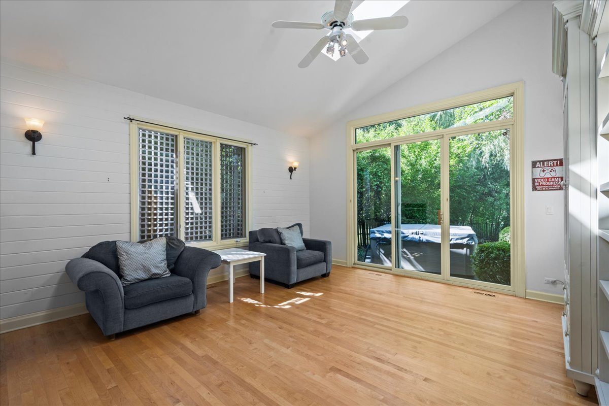 101 Crestview Drive Deerfield, IL 60015 - Photo 16 of 37 a living room with furniture and a large window
