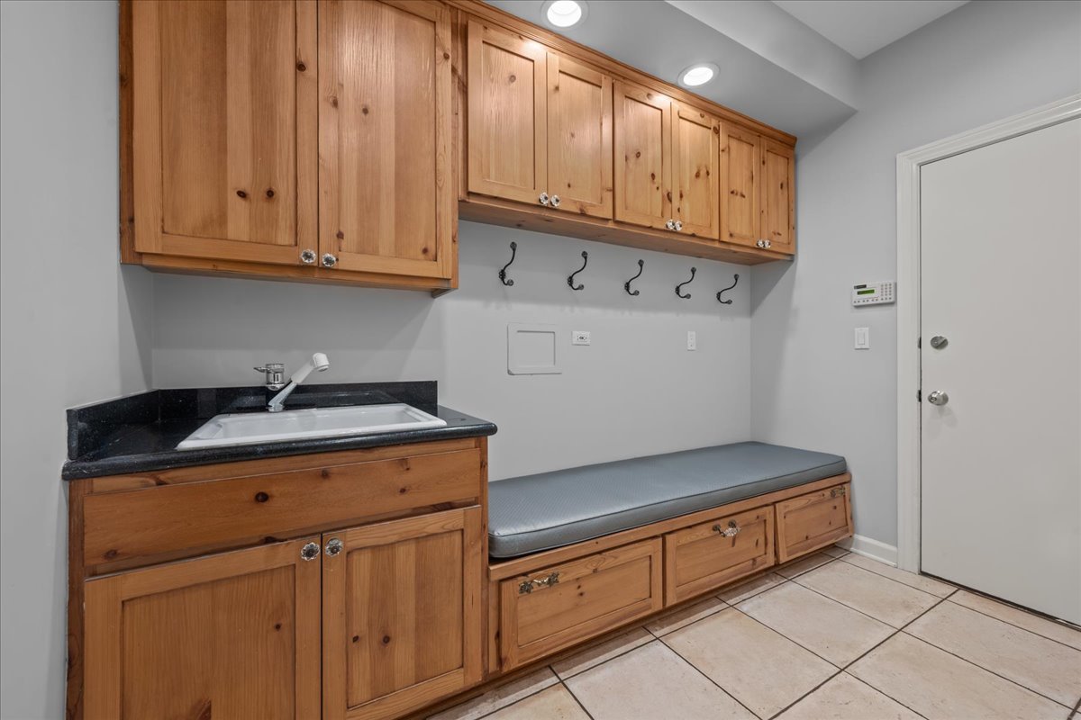 101 Crestview Drive Deerfield, IL 60015 - Photo 17 of 37 a kitchen with stainless steel appliances granite countertop a sink and cabinets