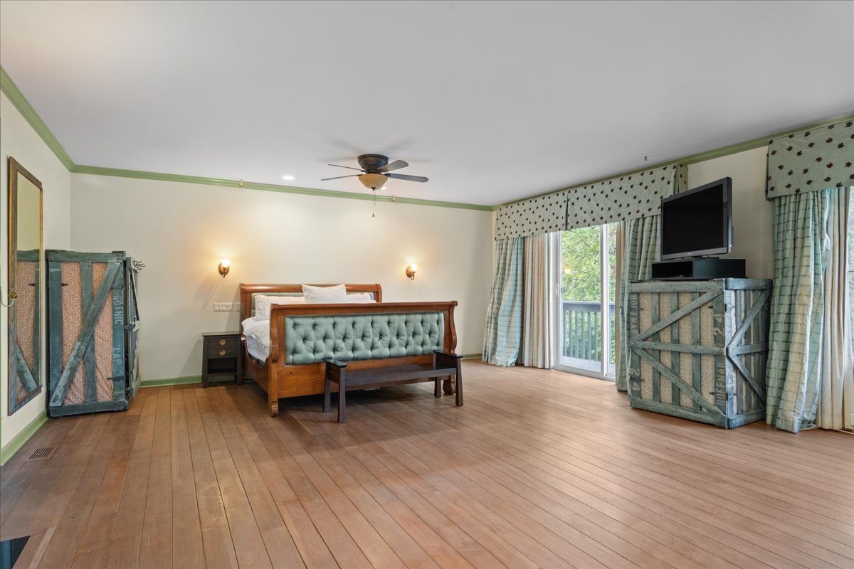 101 Crestview Drive Deerfield, IL 60015 - Photo 19 of 37 a bedroom with furniture and a flat screen tv