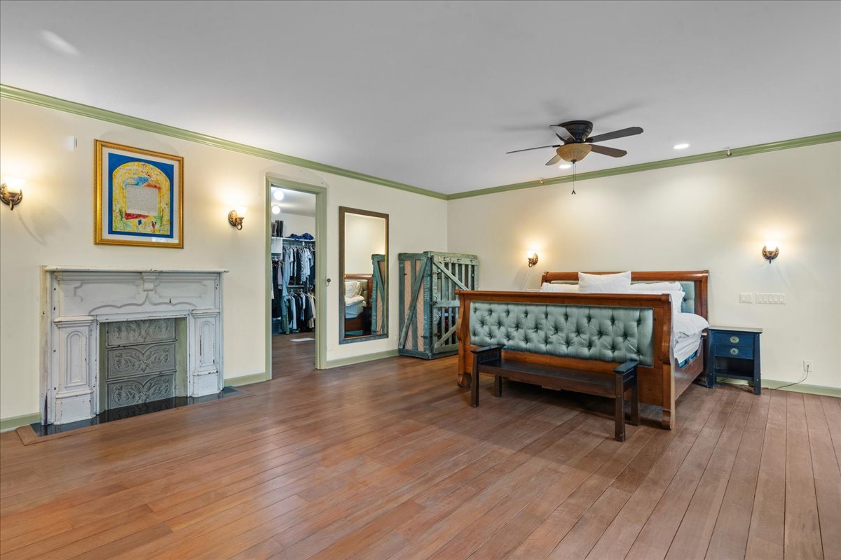101 Crestview Drive Deerfield, IL 60015 - Photo 20 of 37 a bedroom with furniture fireplace and wooden floor