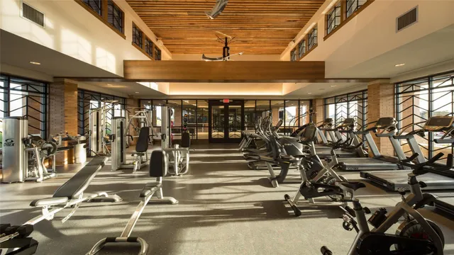 a view of a dining room with furniture and window