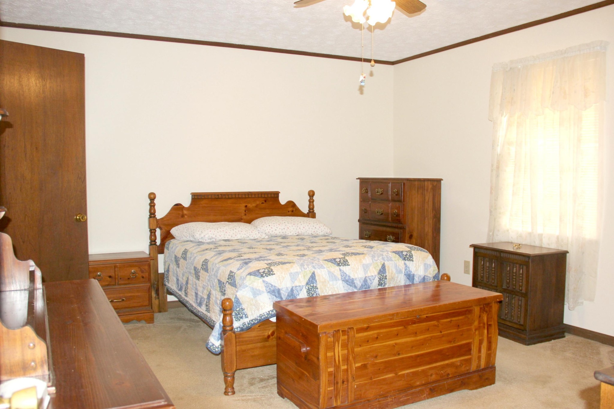 653 Laurel Bluff Road Kingston, TN 37763 - Photo 14 of 20 a bedroom with a bed and a table