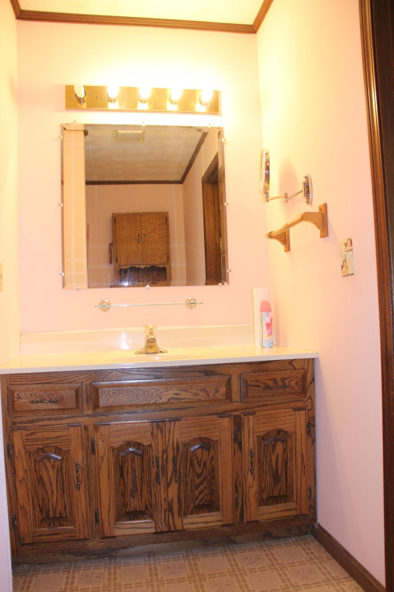 653 Laurel Bluff Road Kingston, TN 37763 - Photo 16 of 20 a bathroom with a sink and a mirror