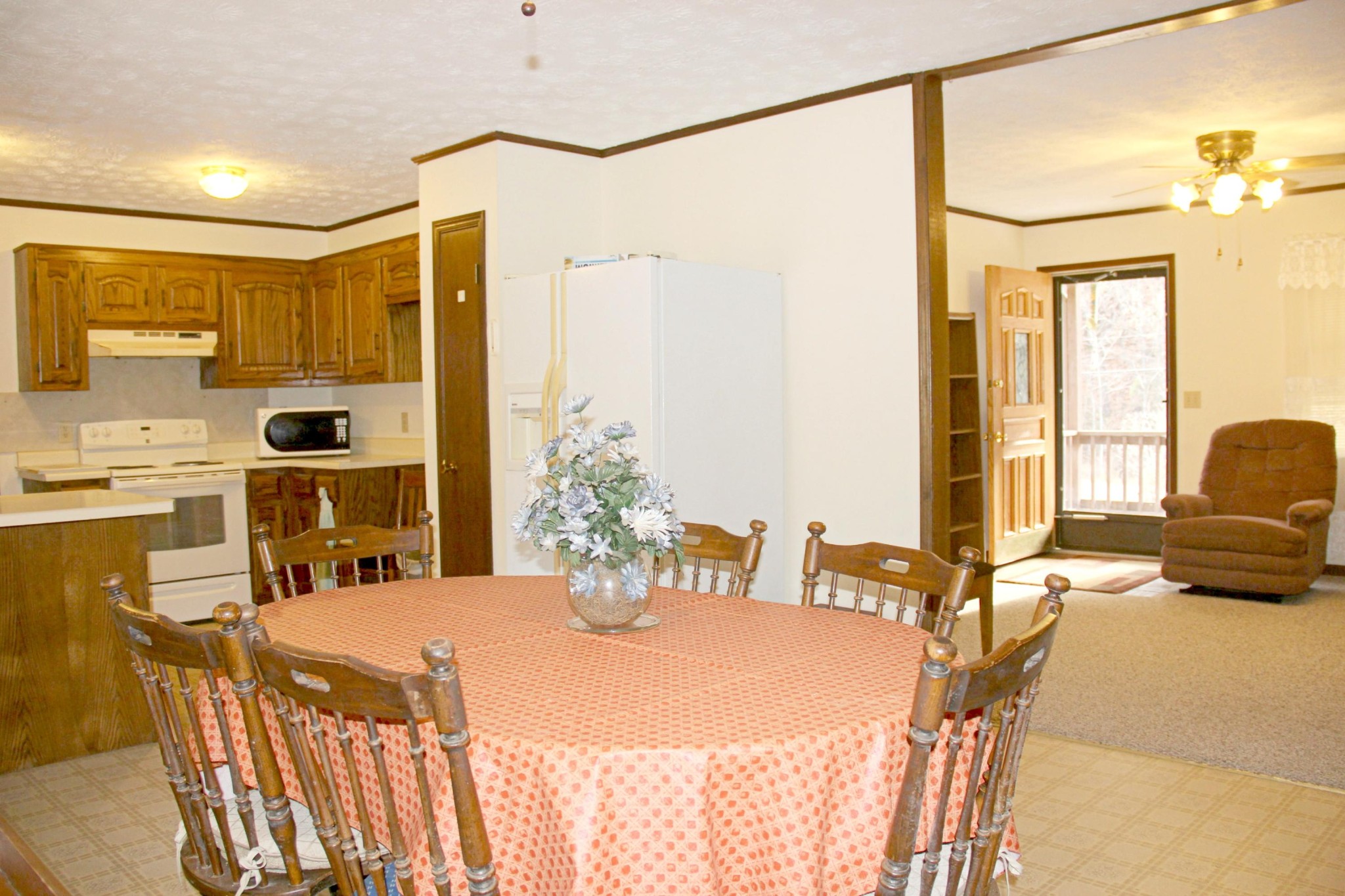 653 Laurel Bluff Road Kingston, TN 37763 - Photo 5 of 20 a view of a dining room with furniture window and outside view