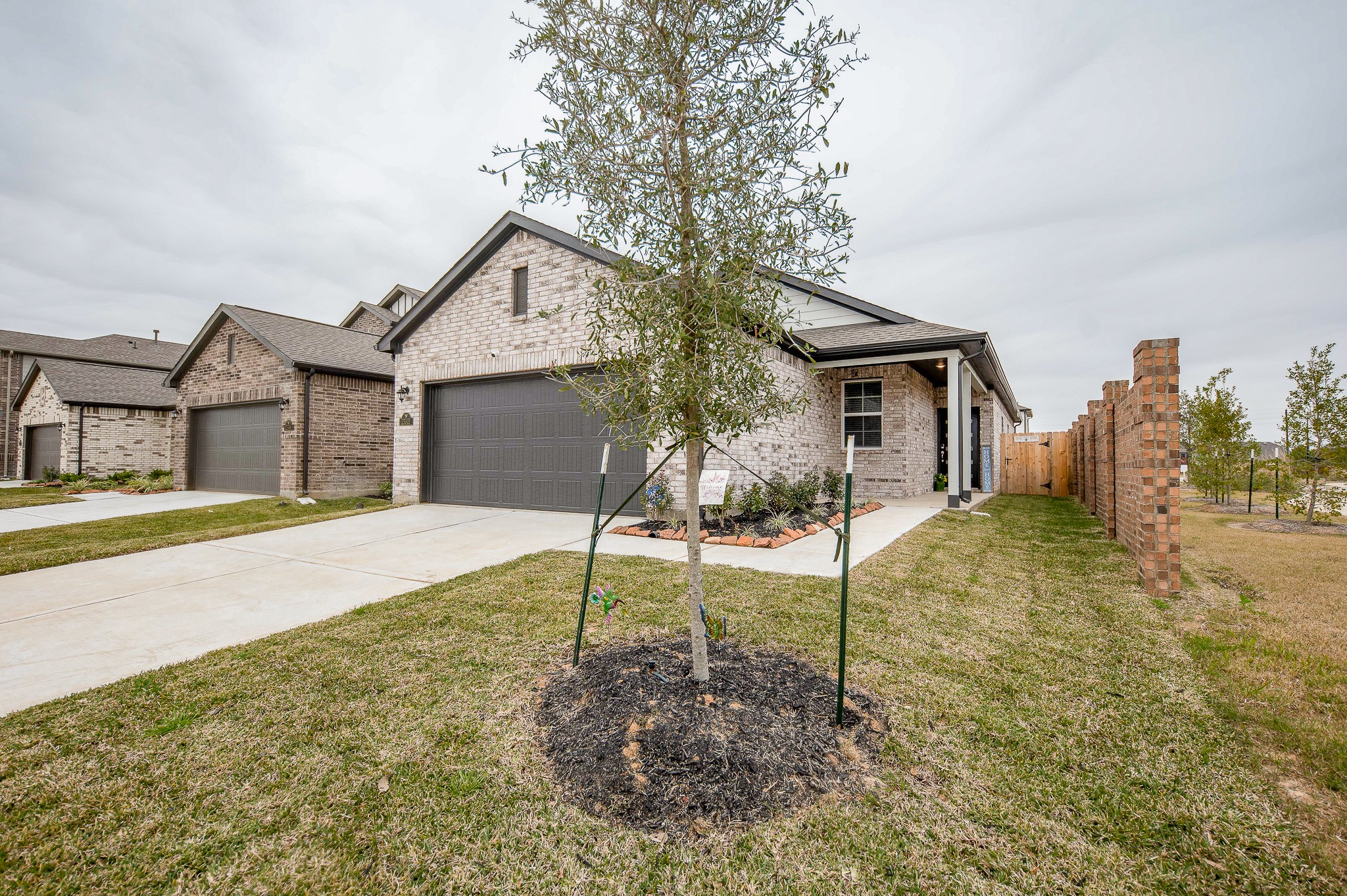23302 Spring Genesis Lane Katy, TX 77493 - Photo 2 of 32 Discover this charming one-story home featuring 4 bedrooms, 2 bathrooms, and inviting spaces for family gatherings and dining, all set in a picturesque neighborhood.