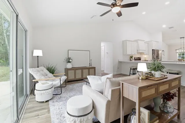 a living room with furniture and a table