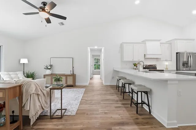 a living room with furniture and a table