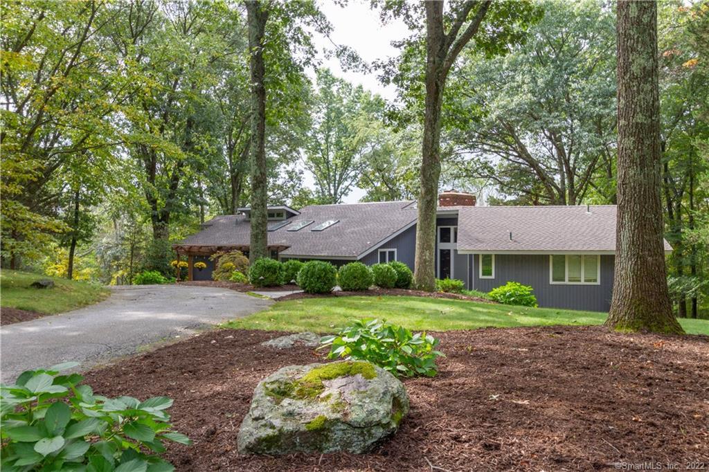 265 Everett Road Easton, CT 06612 - Photo 1 of 1 a house view with a garden space