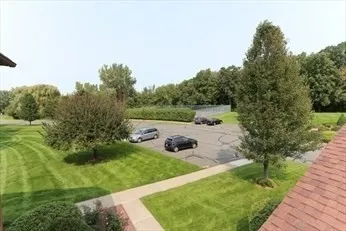 a view of a building with a yard