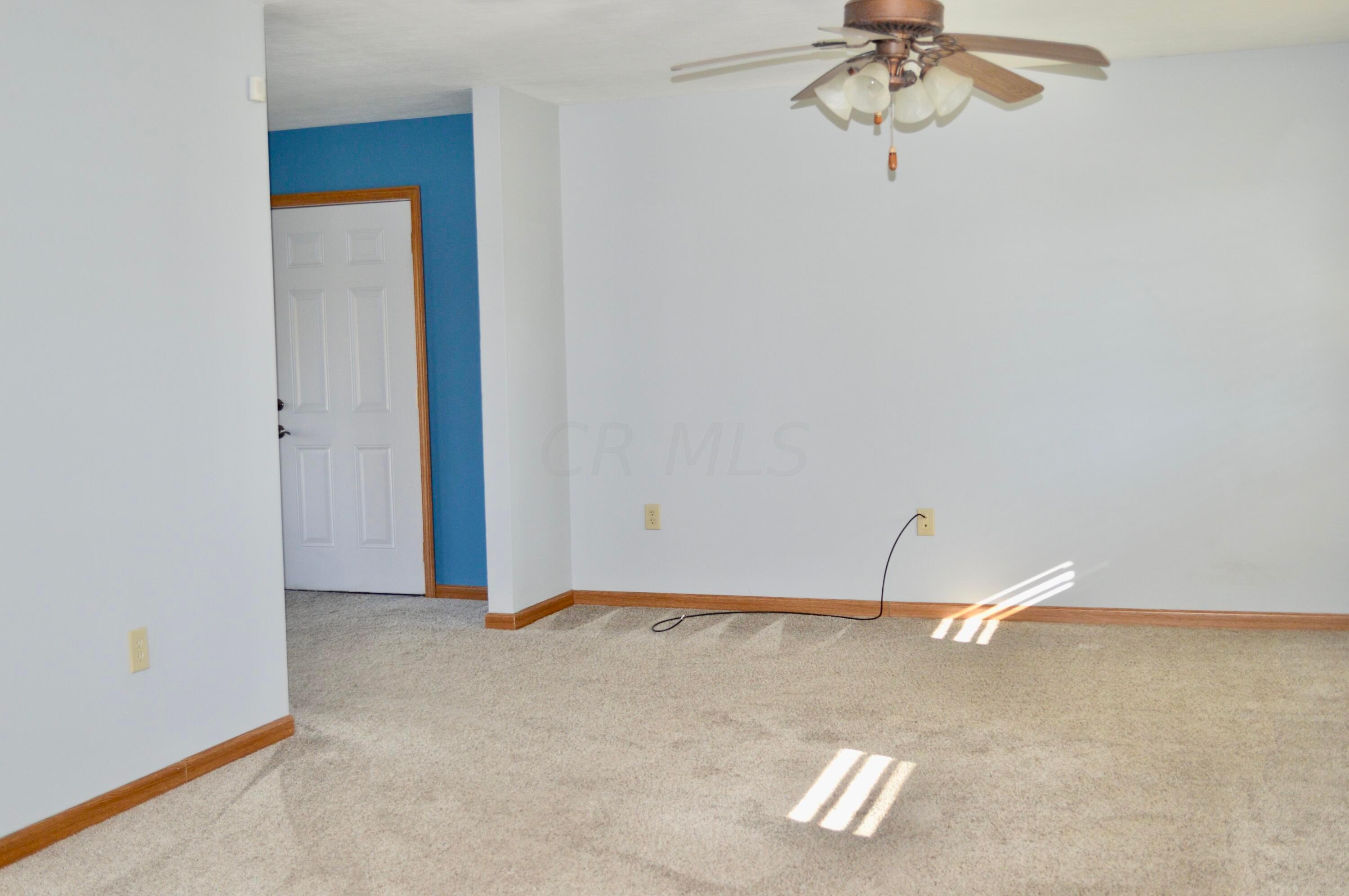 85 Barry Road Southwest Pataskala, OH 43068 - Photo 6 of 30 The Living Room opens to the Dining Area...