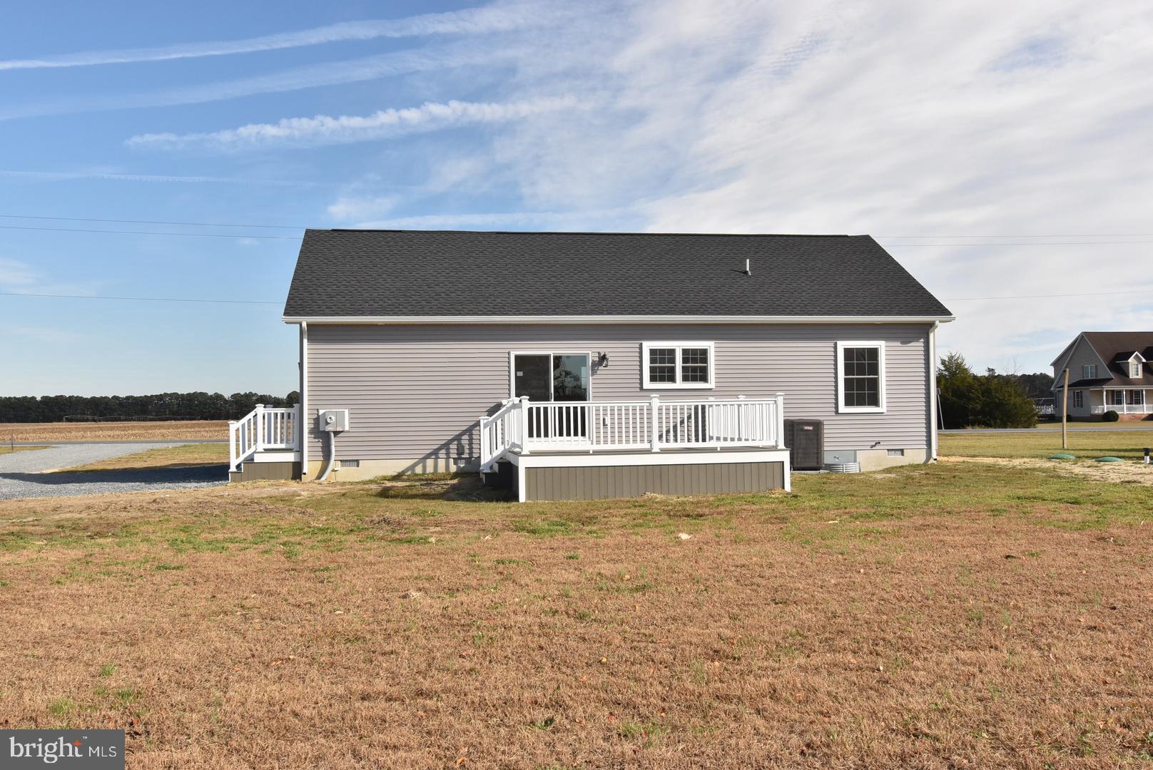 36078 Columbia Road Delmar, DE 19940 - Photo 16 of 20 a house view with swimming pool in front of it