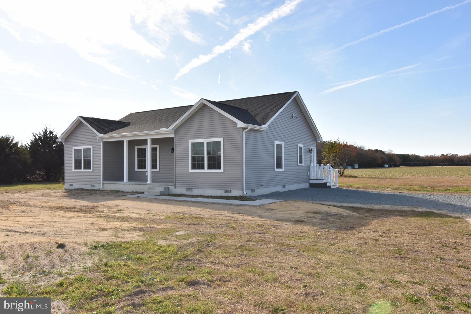 36078 Columbia Road Delmar, DE 19940 - Photo 2 of 20 a view of a house with a yard