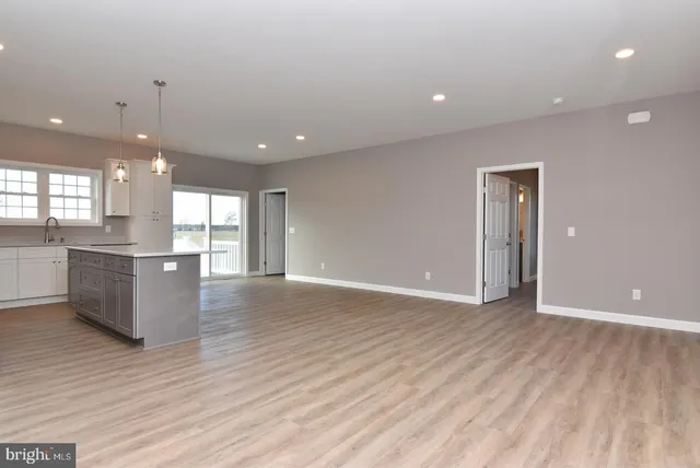 a view of kitchen and windows