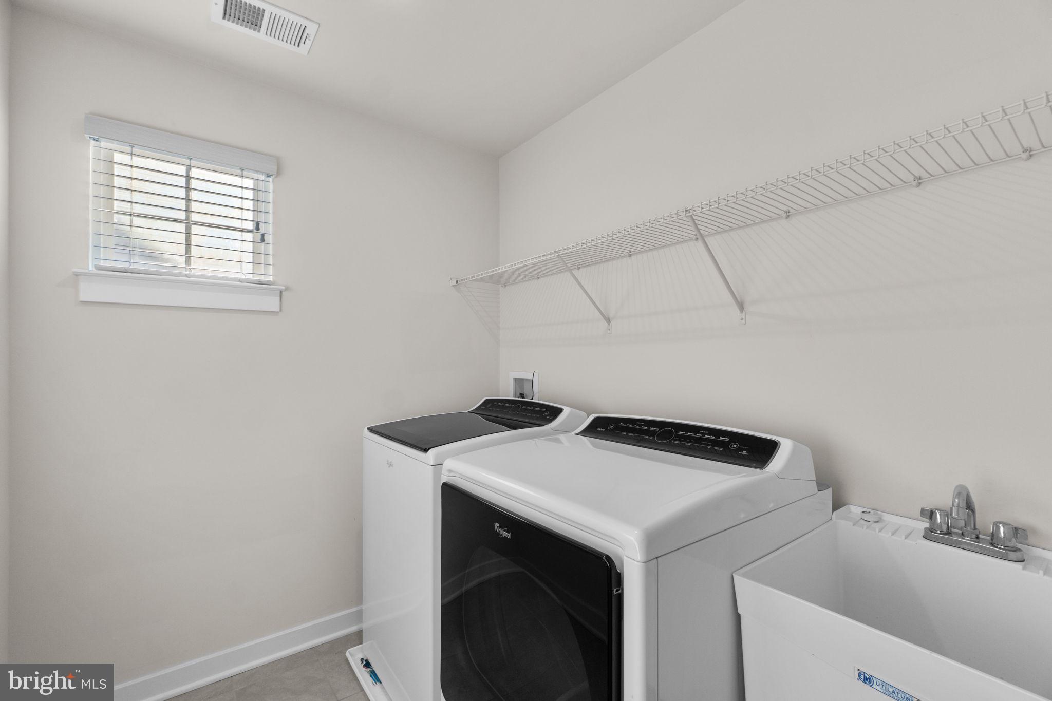 5245 Red Maple Drive Frederick, MD 21703 - Photo 31 of 49 a utility room with dryer and washer