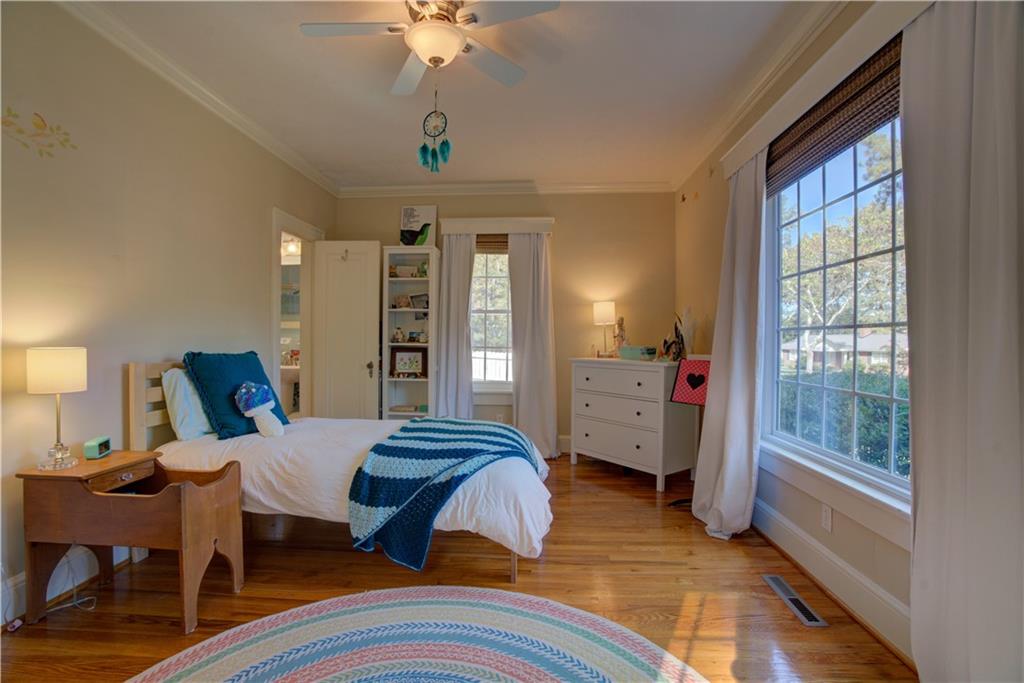 5 Vineland Drive Northwest Rome, GA 30165 - Photo 25 of 54 a bedroom with furniture and a chandelier