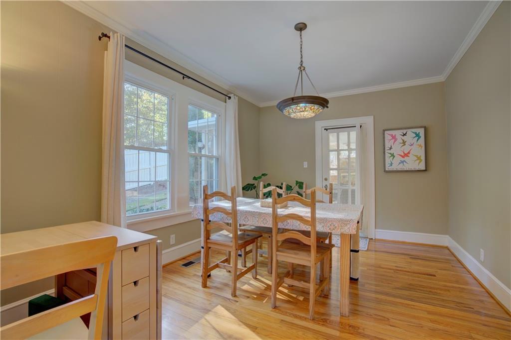 5 Vineland Drive Northwest Rome, GA 30165 - Photo 9 of 54 a view of a dining room with furniture window and wooden floor