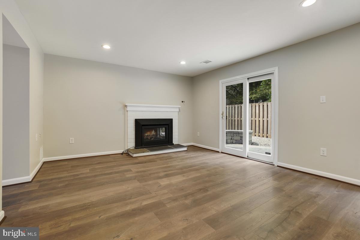 1530 Goldenrain Court Reston, VA 20190 - Photo 40 of 50 Rec Room with Gas Fireplace