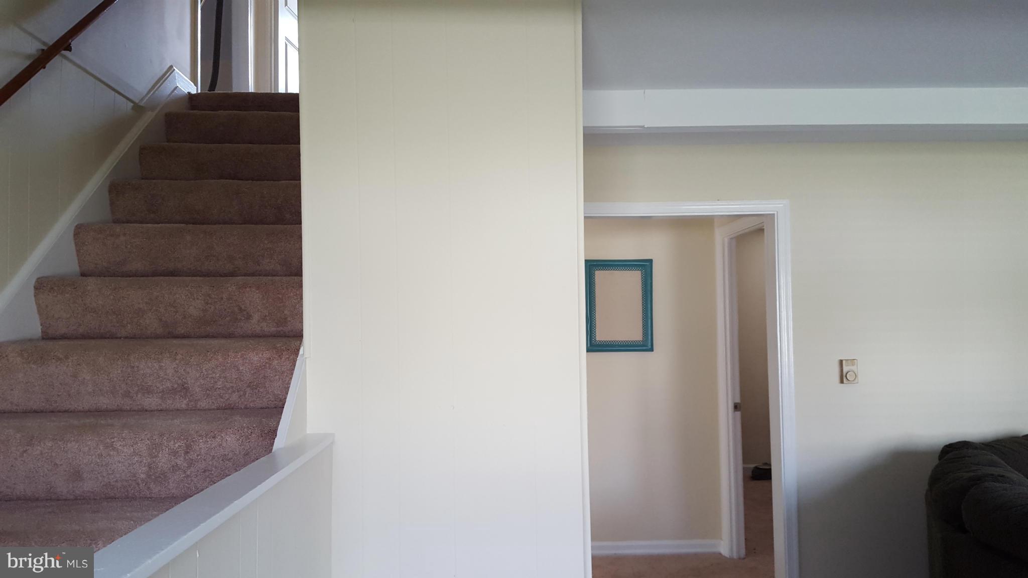 6009 Poplar Road St. Leonard, MD 20685 - Photo 15 of 26 a view of staircase with white walls