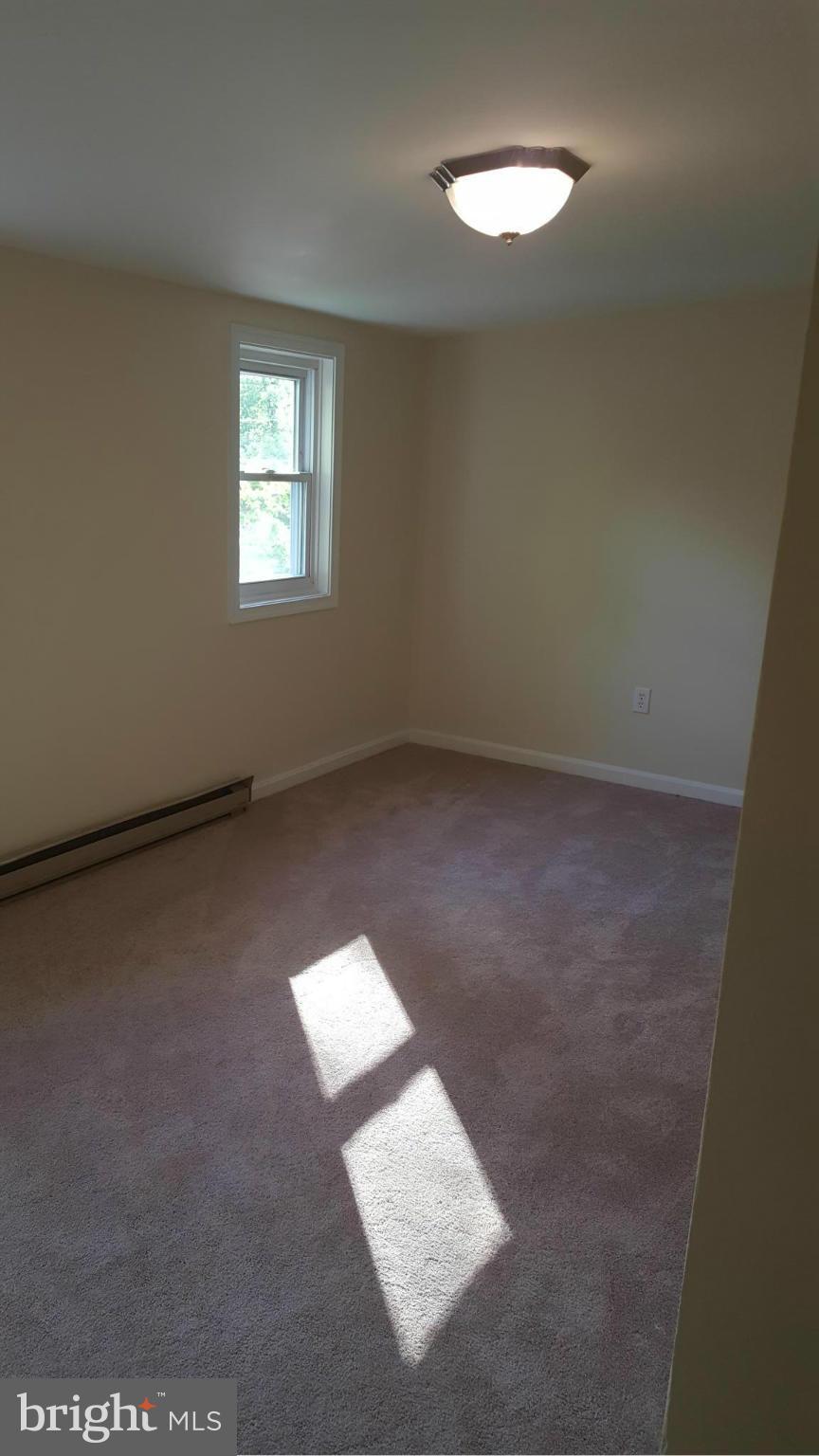6009 Poplar Road St. Leonard, MD 20685 - Photo 18 of 26 an empty room with a window