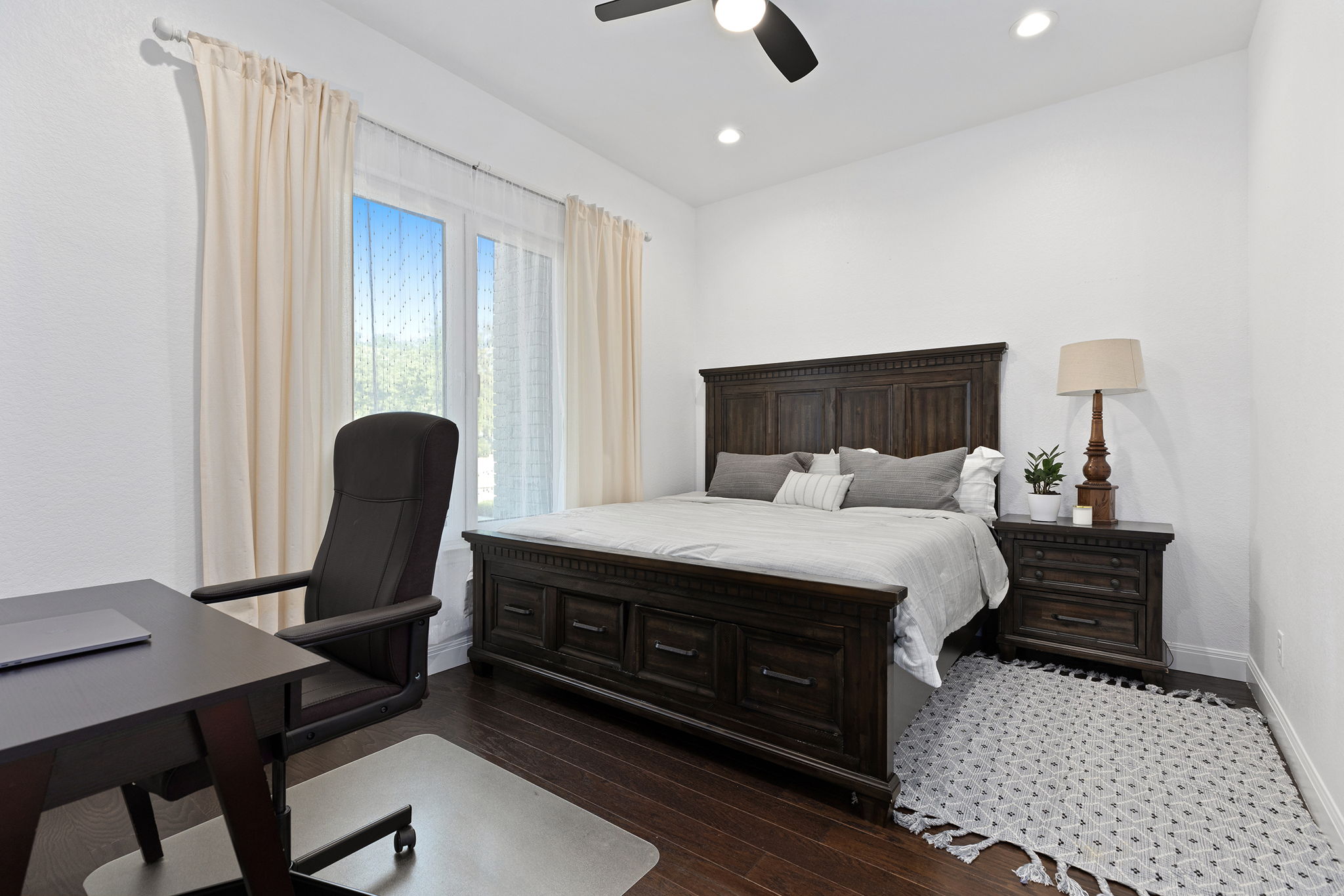 153 Fawn Hollow Elgin, TX 78621 - Photo 32 of 40 a bed room with a bed and a chair