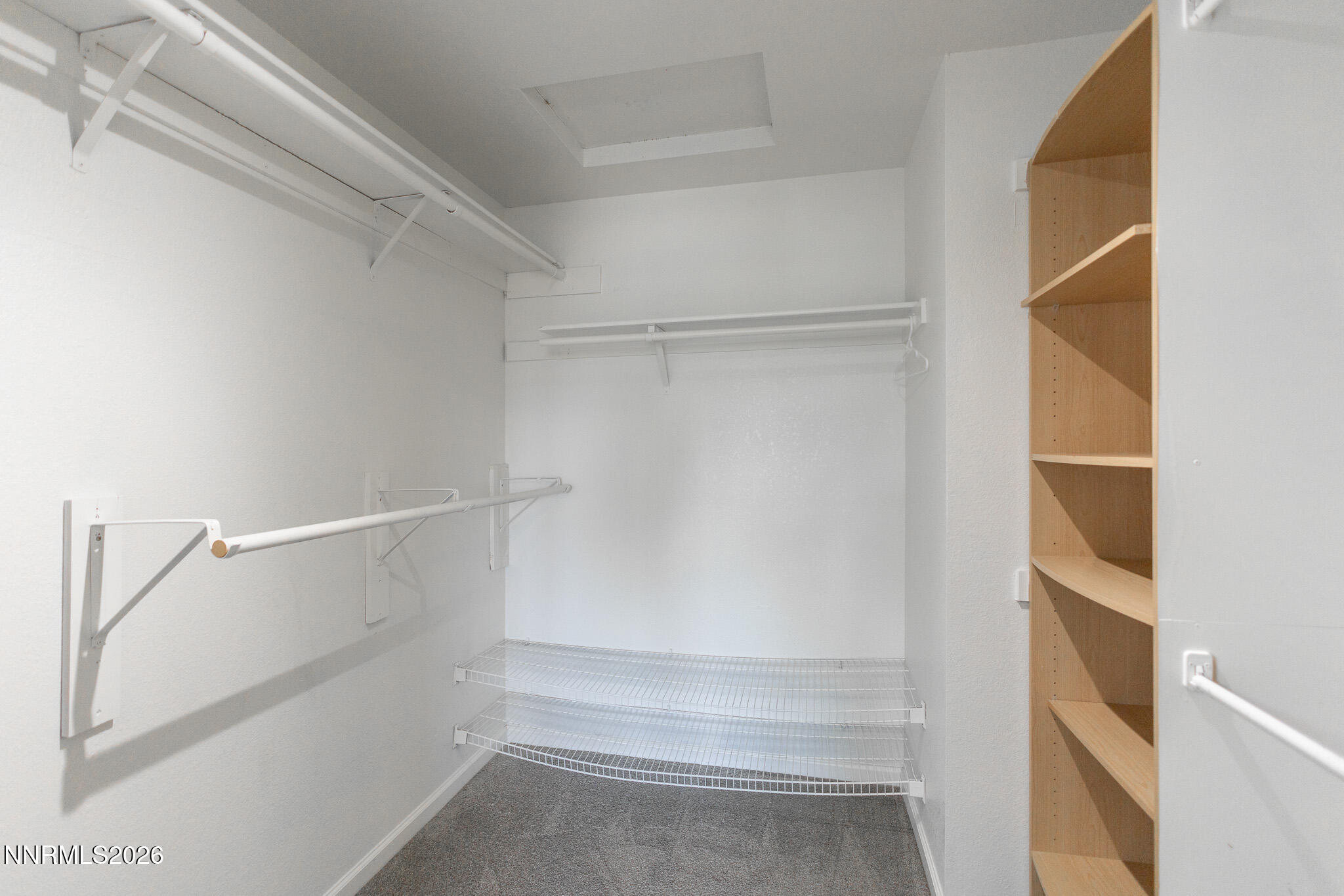 4775 Cedarhill Lane Reno, NV 89519 - Photo 34 of 63 a view of walk in closet with empty racks