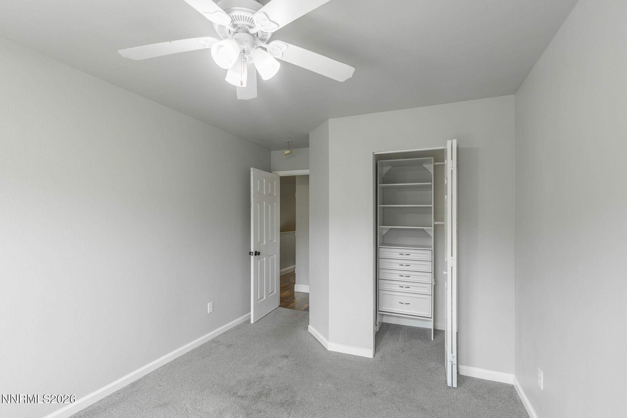 4775 Cedarhill Lane Reno, NV 89519 - Photo 36 of 63 a view of an empty room with a ceiling fan