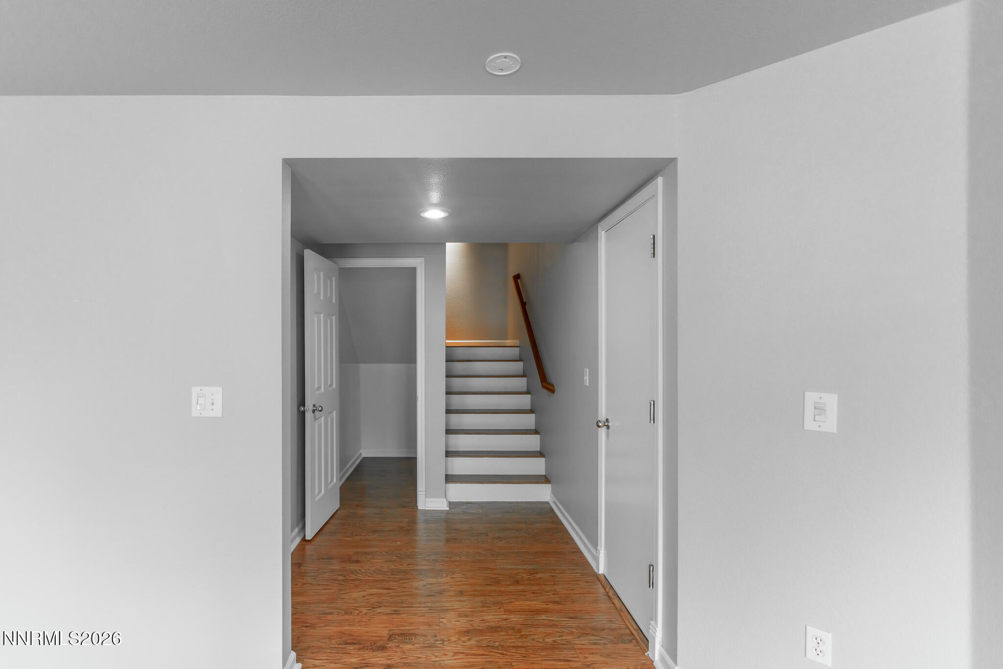 4775 Cedarhill Lane Reno, NV 89519 - Photo 41 of 63 a view of a hallway with wooden floor and entryway