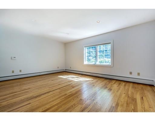 112 Loring Road Weston, MA 02493 - Photo 11 of 24 a view of an empty room and window