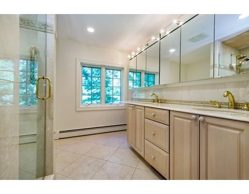 112 Loring Road Weston, MA 02493 - Photo 14 of 24 a bathroom with a sink and a mirror