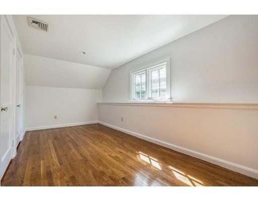 112 Loring Road Weston, MA 02493 - Photo 18 of 24 an empty room with a window