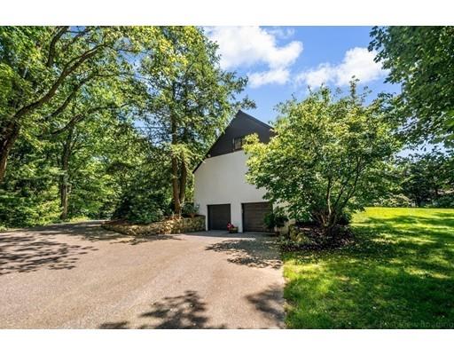 112 Loring Road Weston, MA 02493 - Photo 24 of 24 a backyard of a house with lots of green space