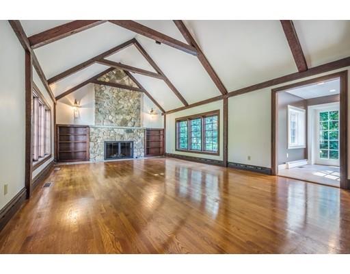 112 Loring Road Weston, MA 02493 - Photo 4 of 24 a view of an empty room with wooden floor and a window