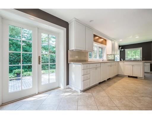 112 Loring Road Weston, MA 02493 - Photo 5 of 24 a view of a kitchen with a sink and a window
