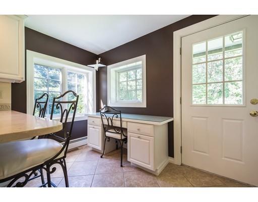 112 Loring Road Weston, MA 02493 - Photo 7 of 24 a view of a dining room with furniture and window