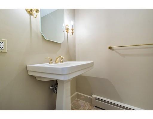 112 Loring Road Weston, MA 02493 - Photo 9 of 24 a bathroom with a sink and a mirror