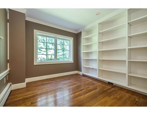 112 Loring Road Weston, MA 02493 - Photo 10 of 24 a view of an empty room with a window and wooden floor