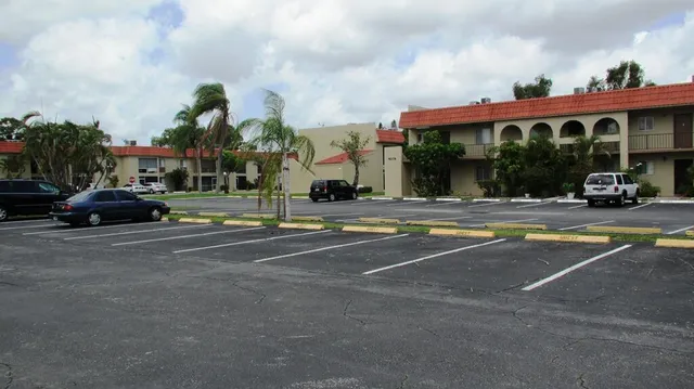 a view of swimming pool from a balcony