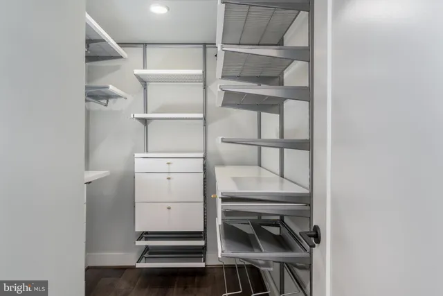 a view of an empty walk in closet