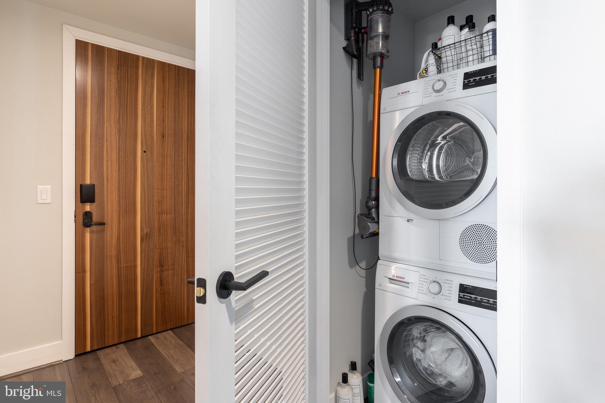 1300 4th Street Southeast, Unit 715 Washington, DC 20003 - Photo 24 of 47 a view of a hallway with washer and dryer