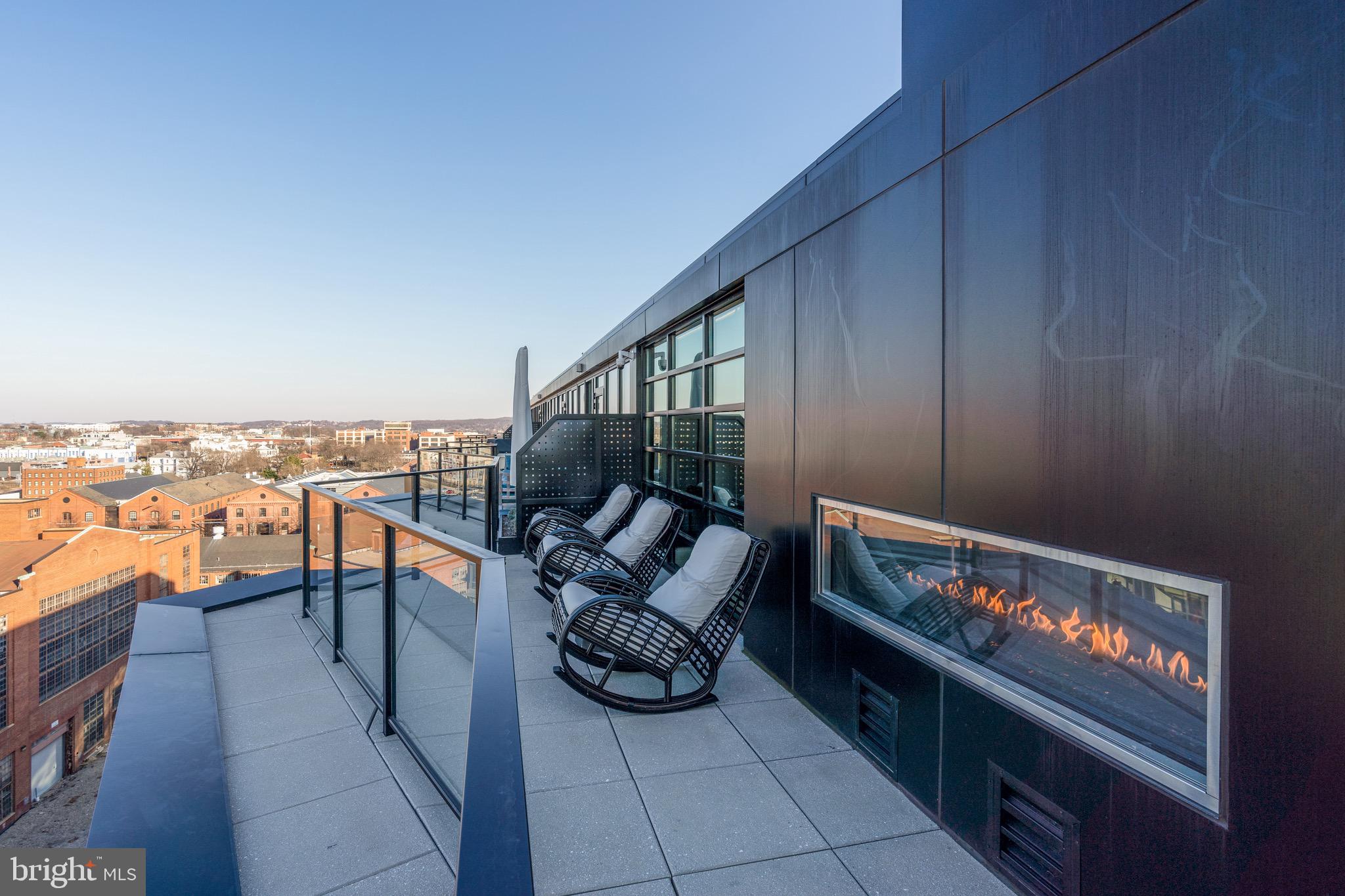 1300 4th Street Southeast, Unit 715 Washington, DC 20003 - Photo 29 of 47 a balcony with furniture and city view