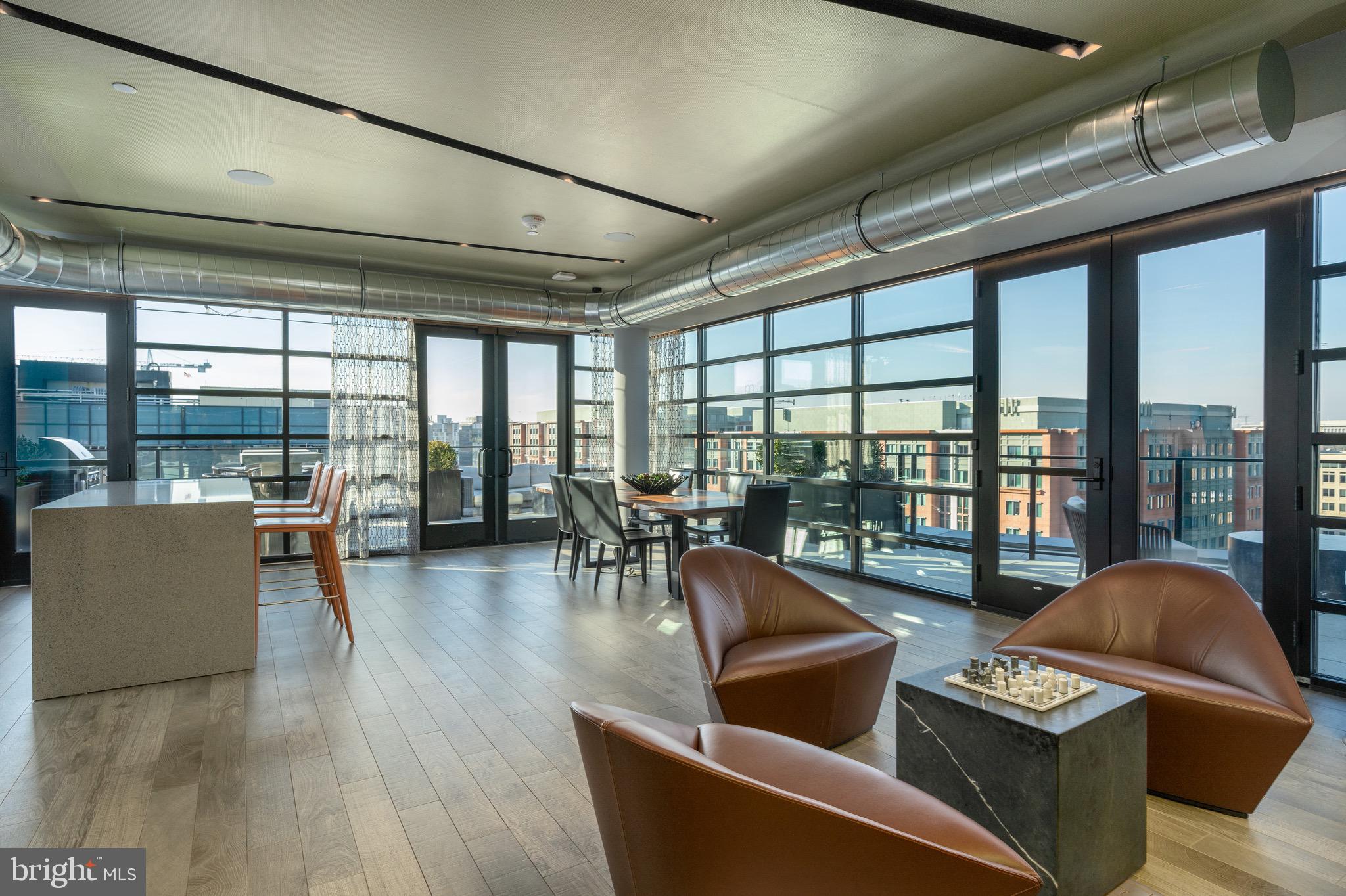 1300 4th Street Southeast, Unit 715 Washington, DC 20003 - Photo 32 of 47 a living room with furniture and a large window