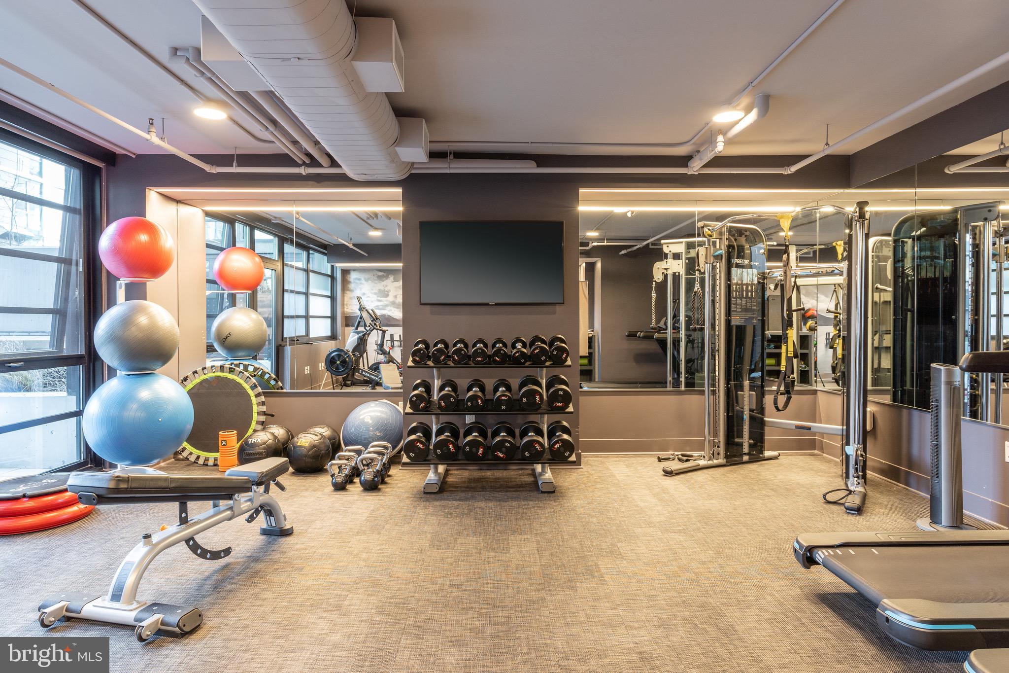 1300 4th Street Southeast, Unit 715 Washington, DC 20003 - Photo 34 of 47 a room with gym equipment