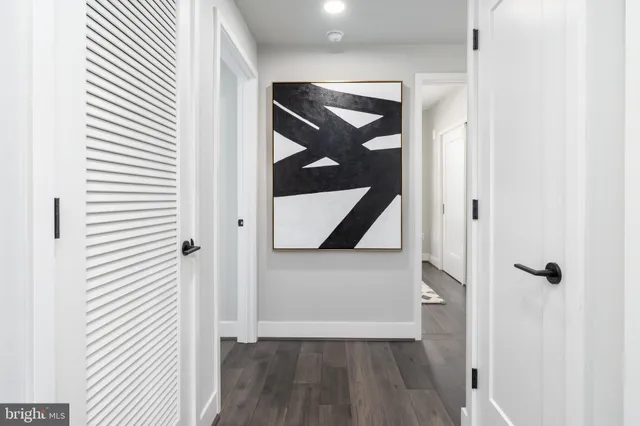 an entryway view with a wooden floor